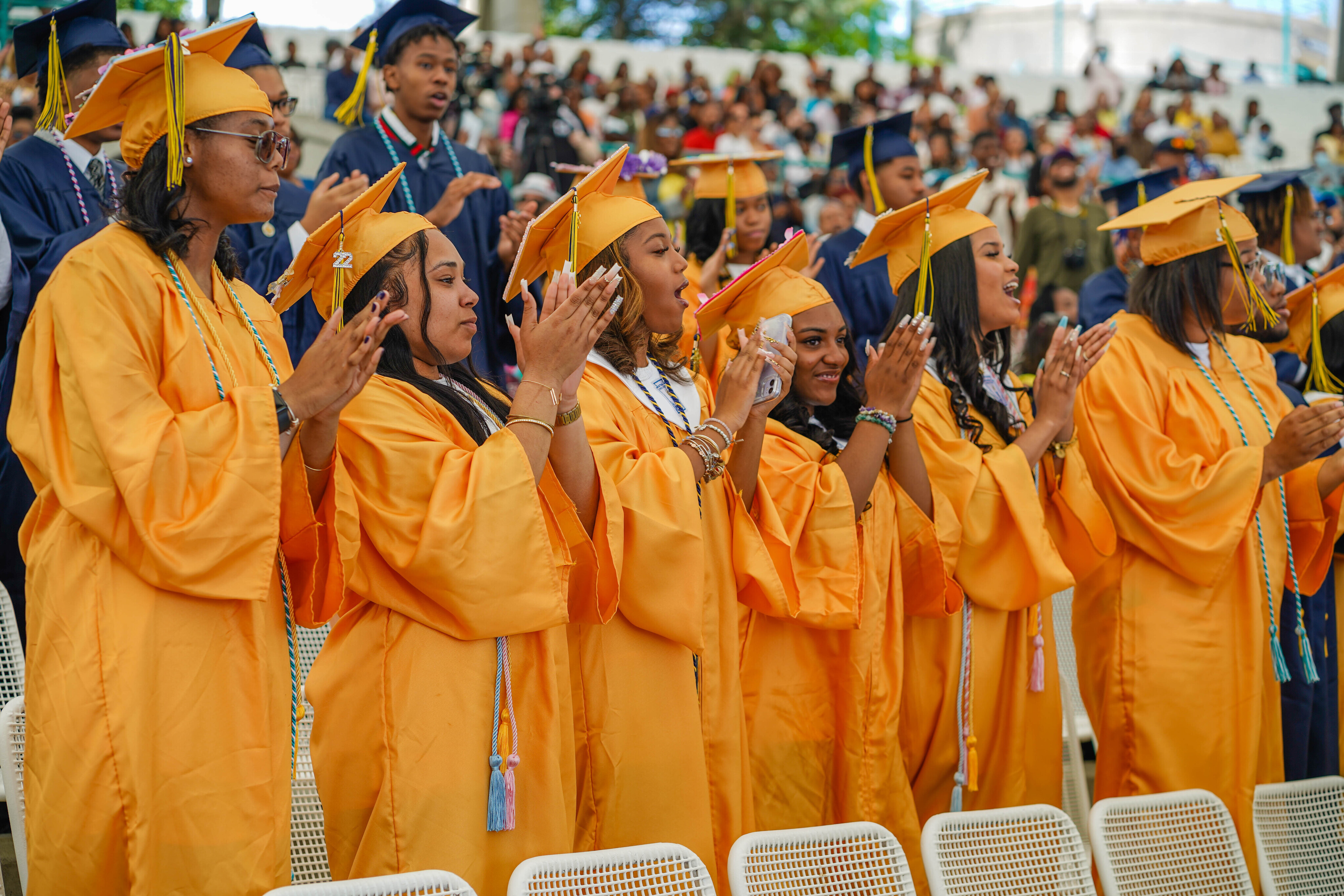 U 2022 Graduation--Graduates cheering for valedictorian speech