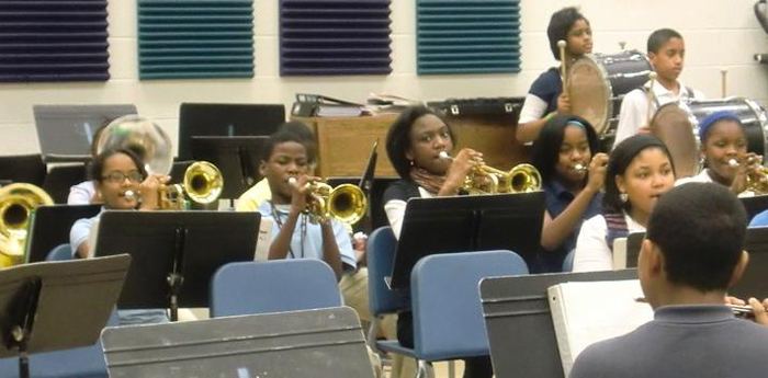 The trumpet section of the band practice in Band class