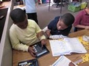 Students using an iPad